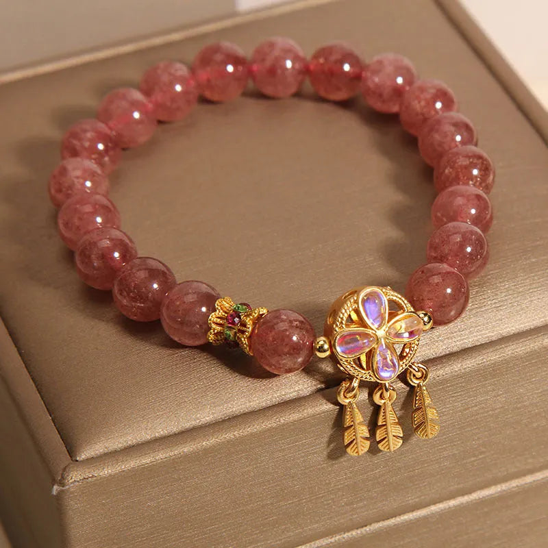 Women's strawberry quartz bracelet with four leaf clover dream catcher crystal pendant