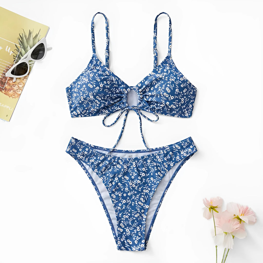 Blue polyester swimsuit three-piece set without underwire showing top and shorts separated