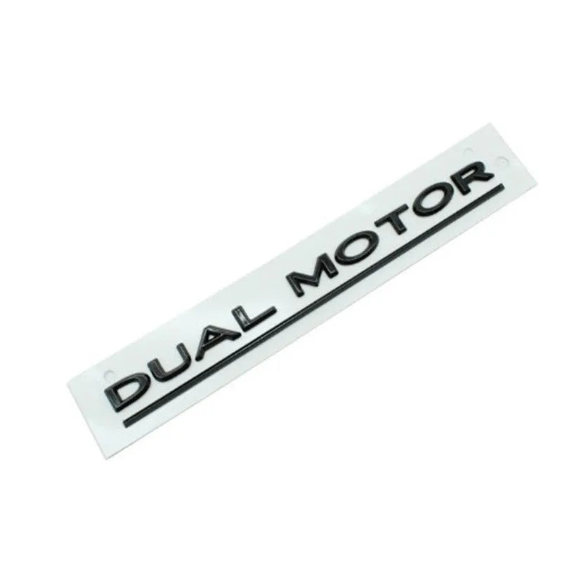 Tesla Model 3 Performance rear bumper sticker in ABS plastic, 19cm by 3cm, shown in matte black and stripe variants.