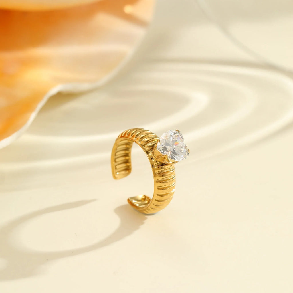 Gold electroplated stainless steel ring with zircon stones and open mouth adjustable design