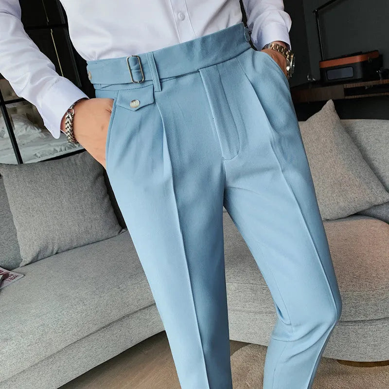 Straight-leg casual trousers in solid colour on hanger showing waistband and leg detail