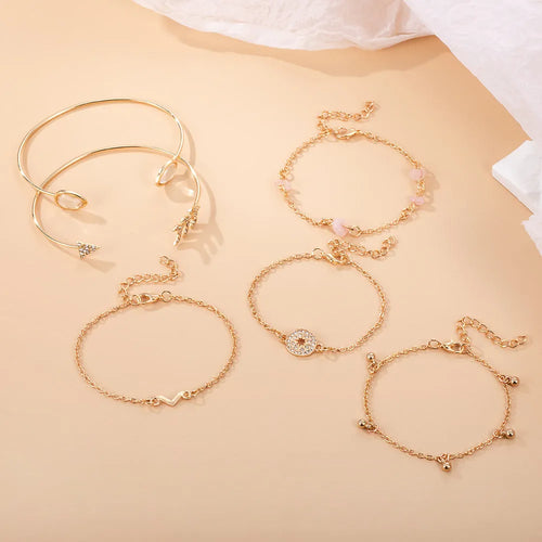 6 piece gold women's bracelet set with water droplet and arrow-shaped charms on zinc alloy construction