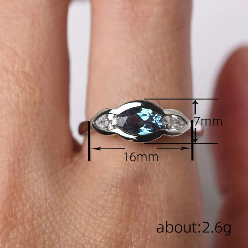 White gold geometric ellipse women's ring with zircon inlay on copper