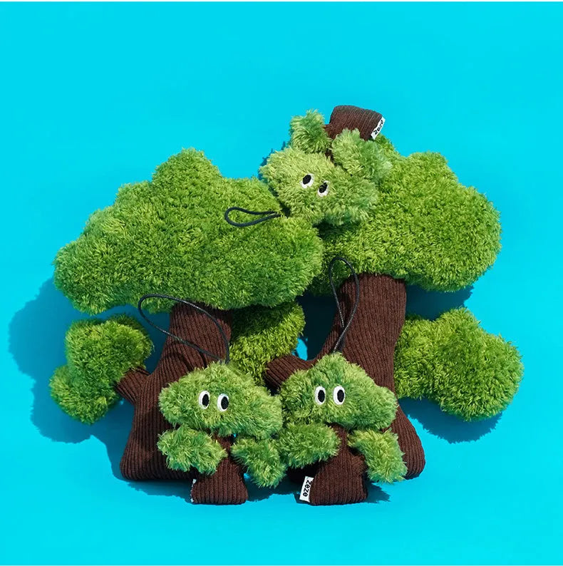 Plush pine tree-shaped cat toy with mint filling, shown in three available sizes for feline biting and grinding play.