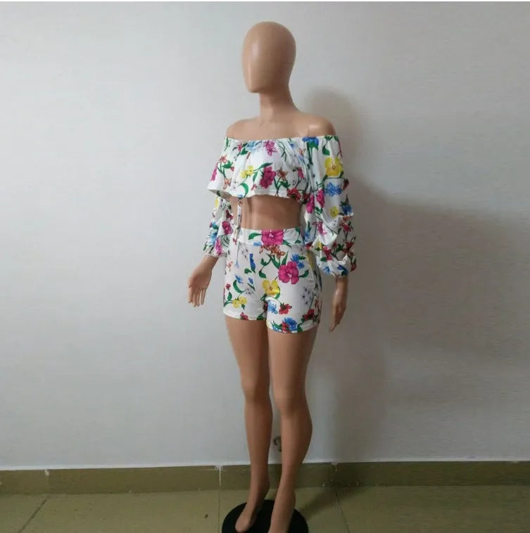 Multicolour digitally printed women's two-piece lounge set with pile sleeves and shorts.