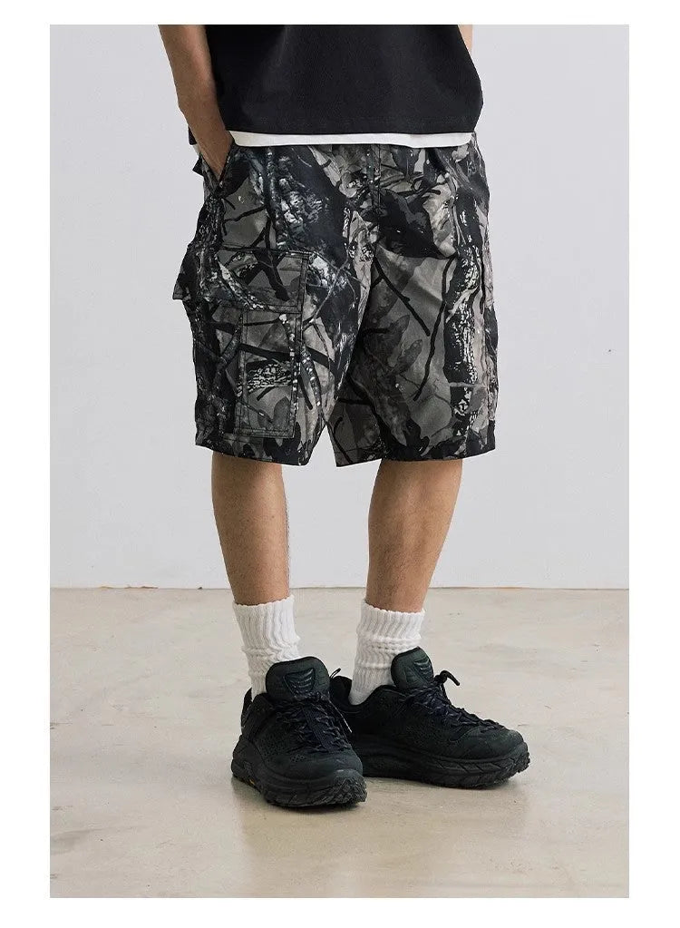 Loose straight-leg casual shorts in cotton denim, shown in army green colour.