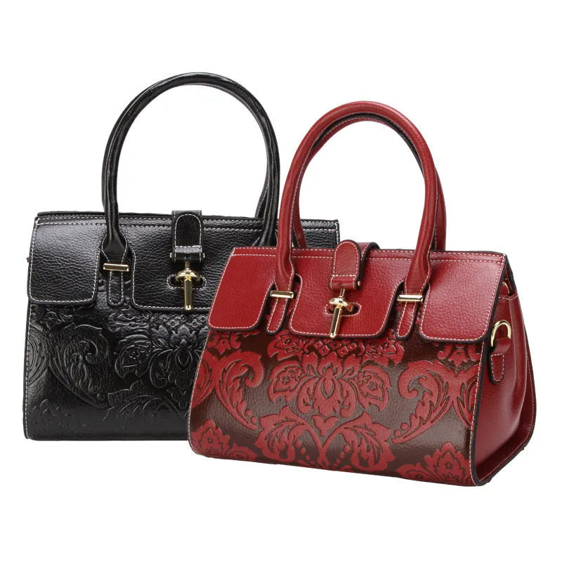 Oval vintage embossed genuine leather crossbody bag showing internal compartments