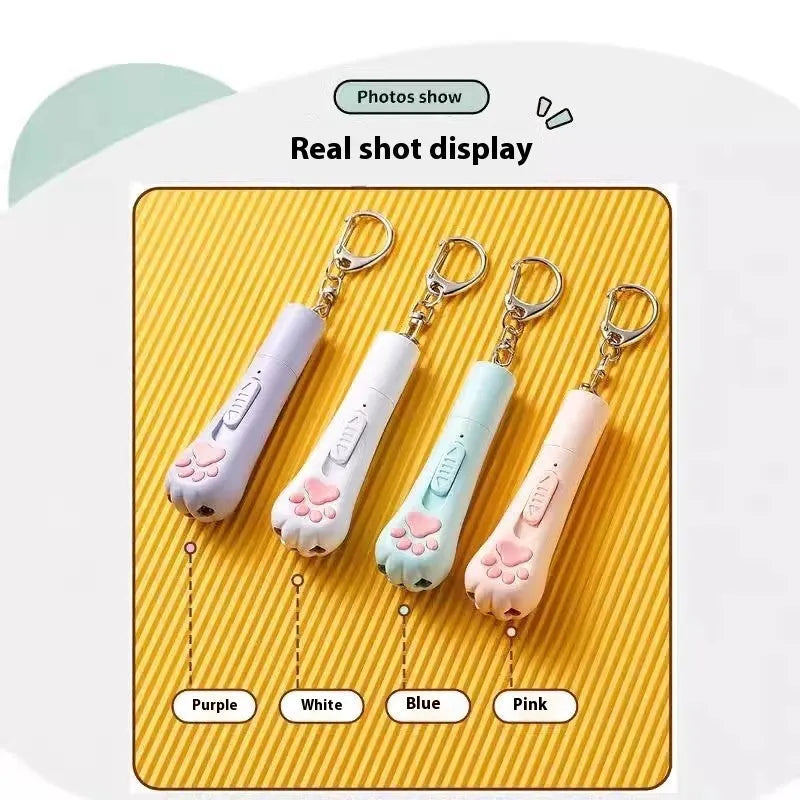 Cat teasing pen light toy with self-hi feature in cream white, pink or sky blue colour options