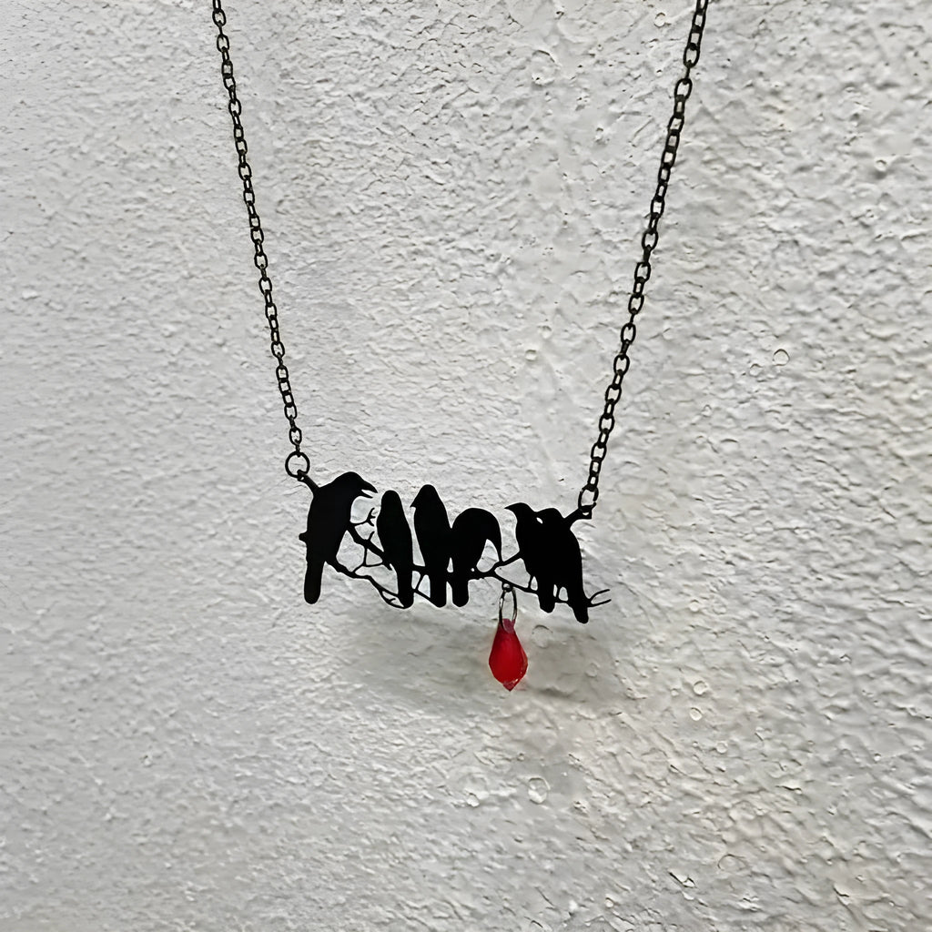 Black crow necklace on cross chain with electroplated finish and animal modelling