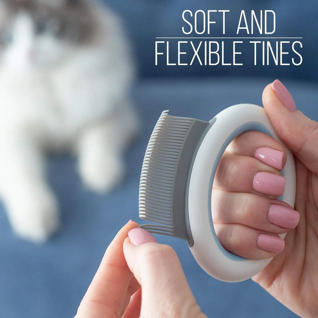 Blue pet grooming comb for deshedding cats and dogs on a white background.