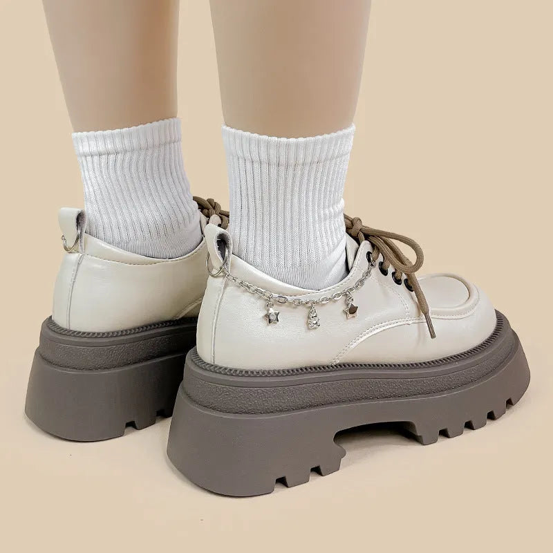 White platform Mary Jane shoes with thick chunky heel and front lace-up in XINGX bear colour
