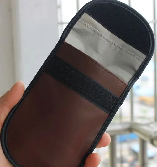 Black microfiber RFID signal blocker bag measuring 13.5 by 9.5 centimetres