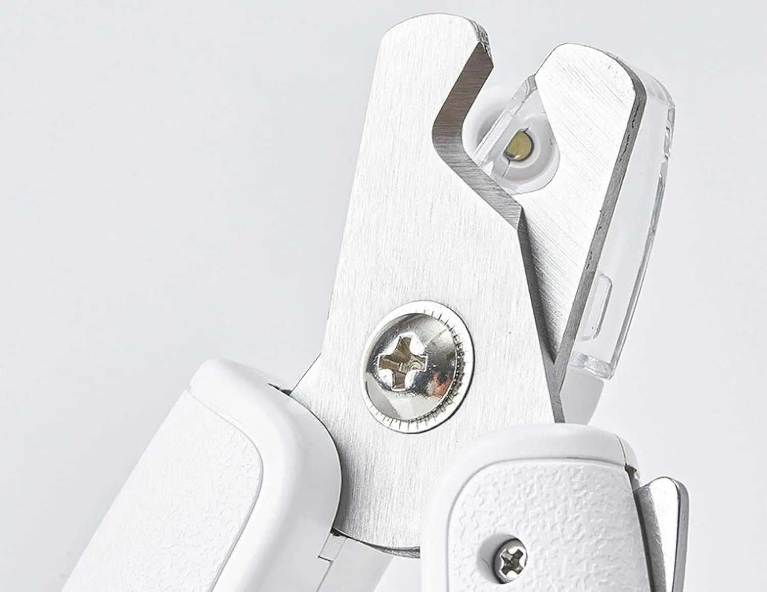 White pet nail clippers with LED light, transparent anti-splash guard and triangular blade for dogs and cats