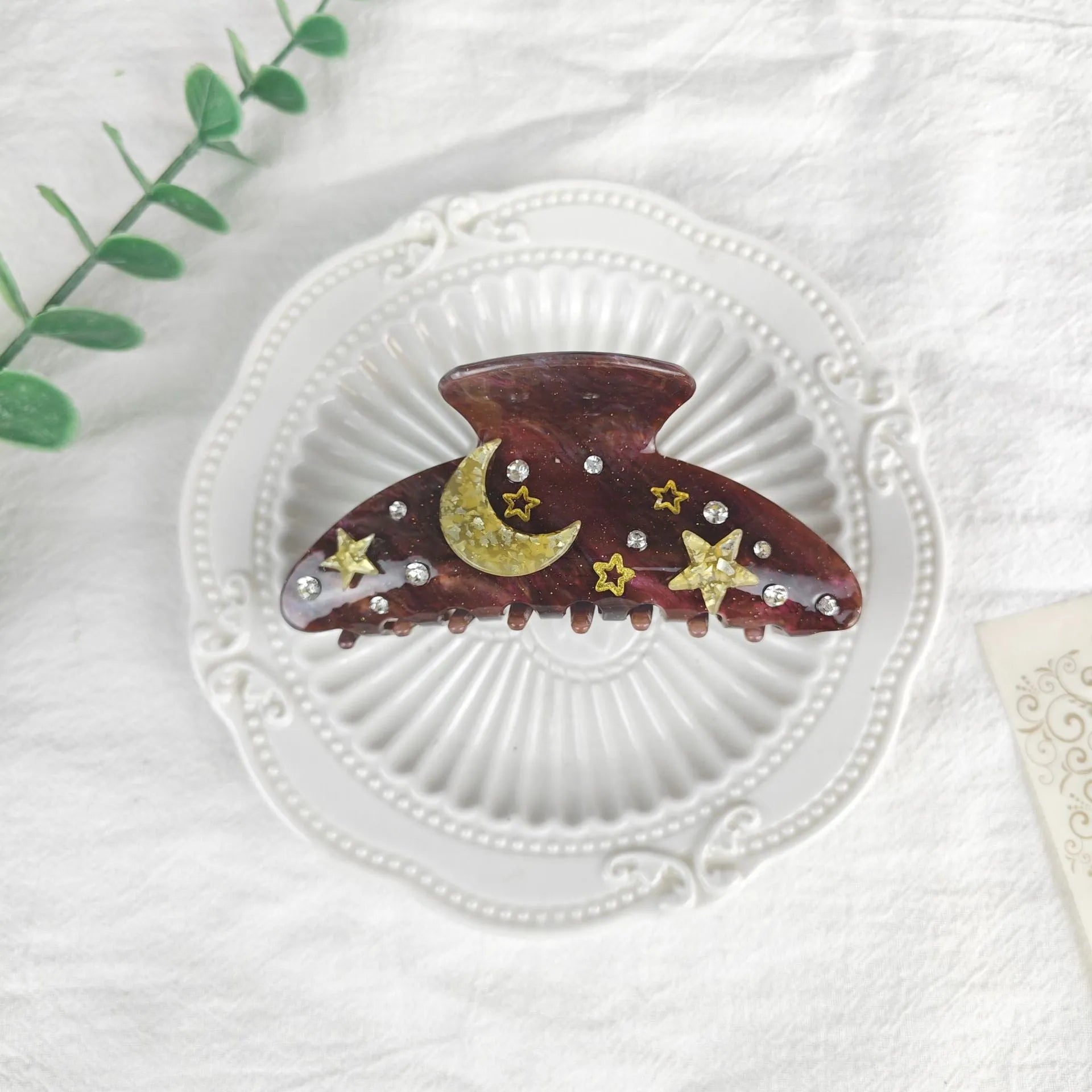 Oversized star moon barrette in celestial colours with irregular minimalist design
