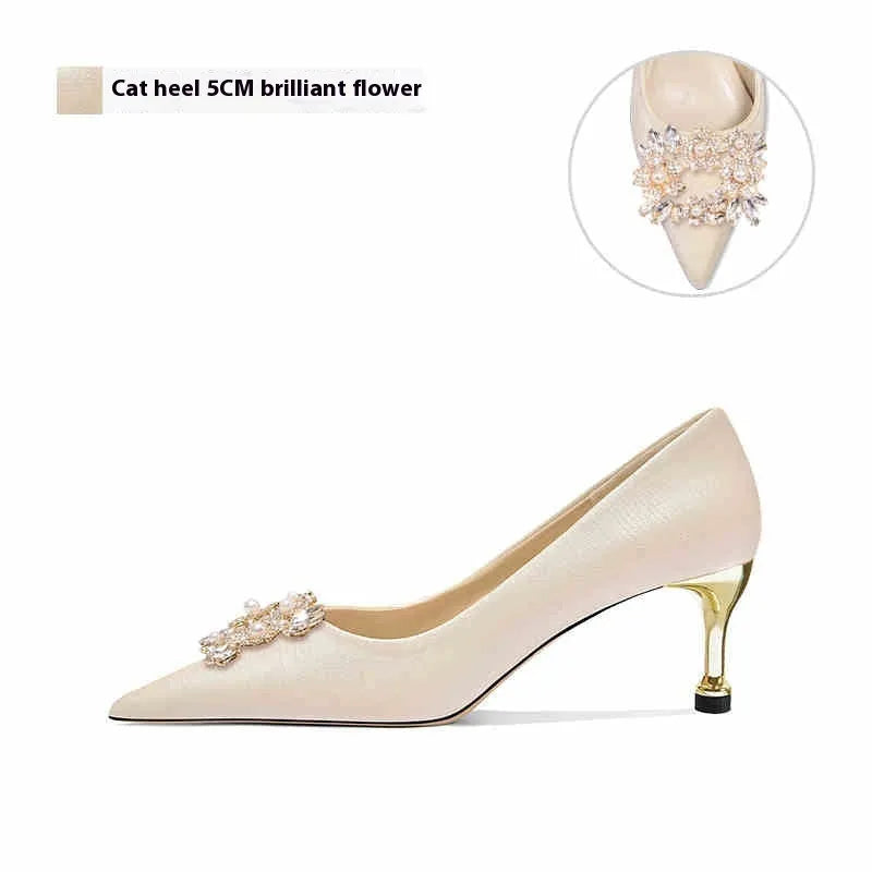 Women's pointed-toe high heel shoes with rhinestone decoration on cloth upper, showing stiletto and cat heel style options.