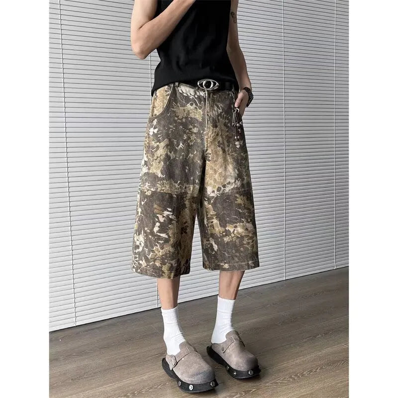 Women's yellow snake camouflage print cropped jeans on a model.