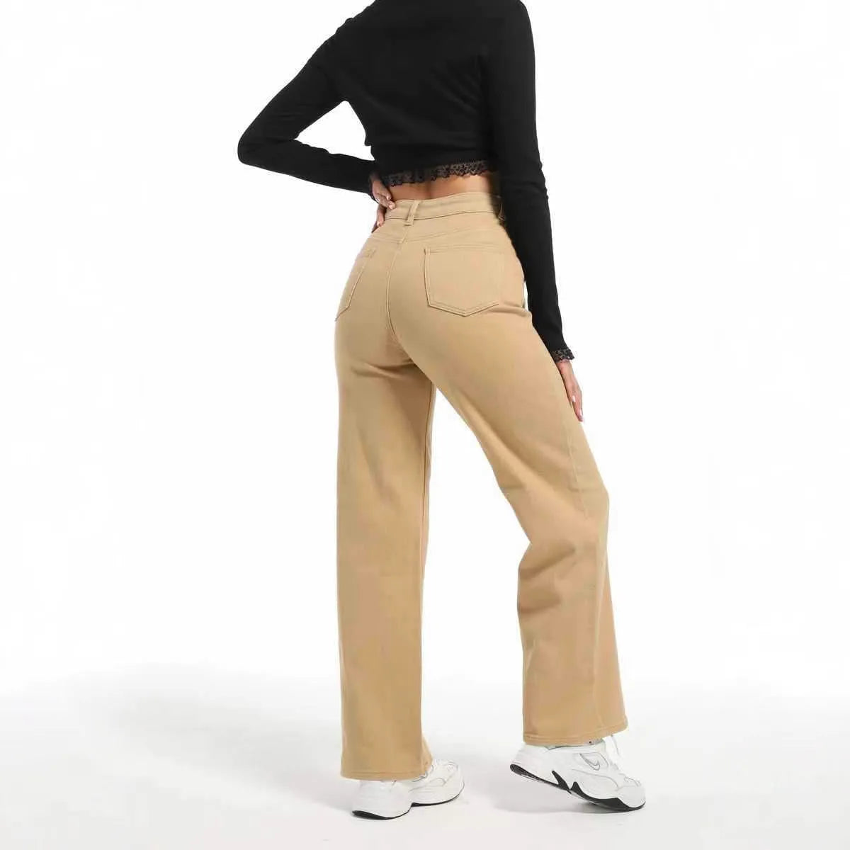 Women's high-waist straight leg wide jeans in apricot colour on a hanger.
