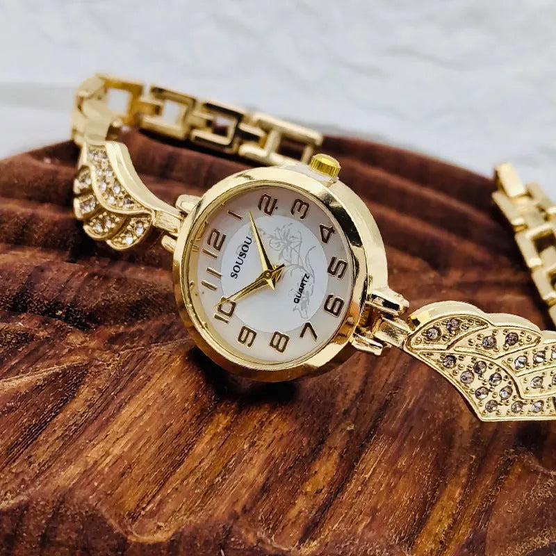 Women's stainless steel watch with round dial on a metal strap with Vachette clasp.