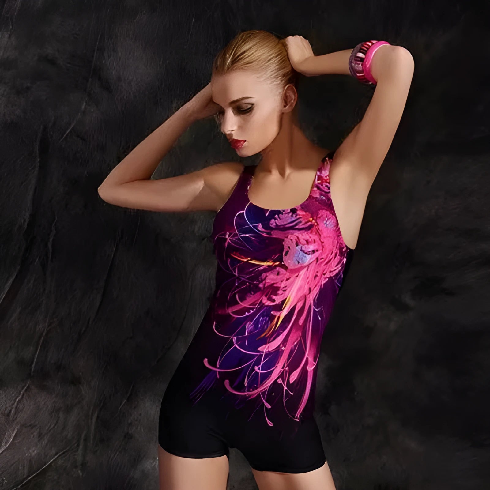 Women's black and blue one-piece swimsuit with a conservative, sleeveless design for swimming sports.