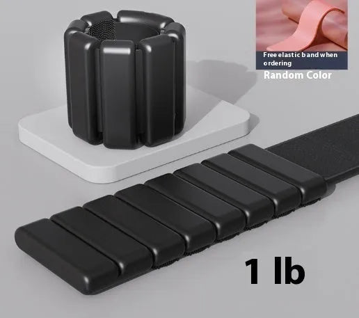 Silicone fitness bracelet with Velcro strap shown in pink, black, grey, and blue colours, with 1lb and 2lb weight options.