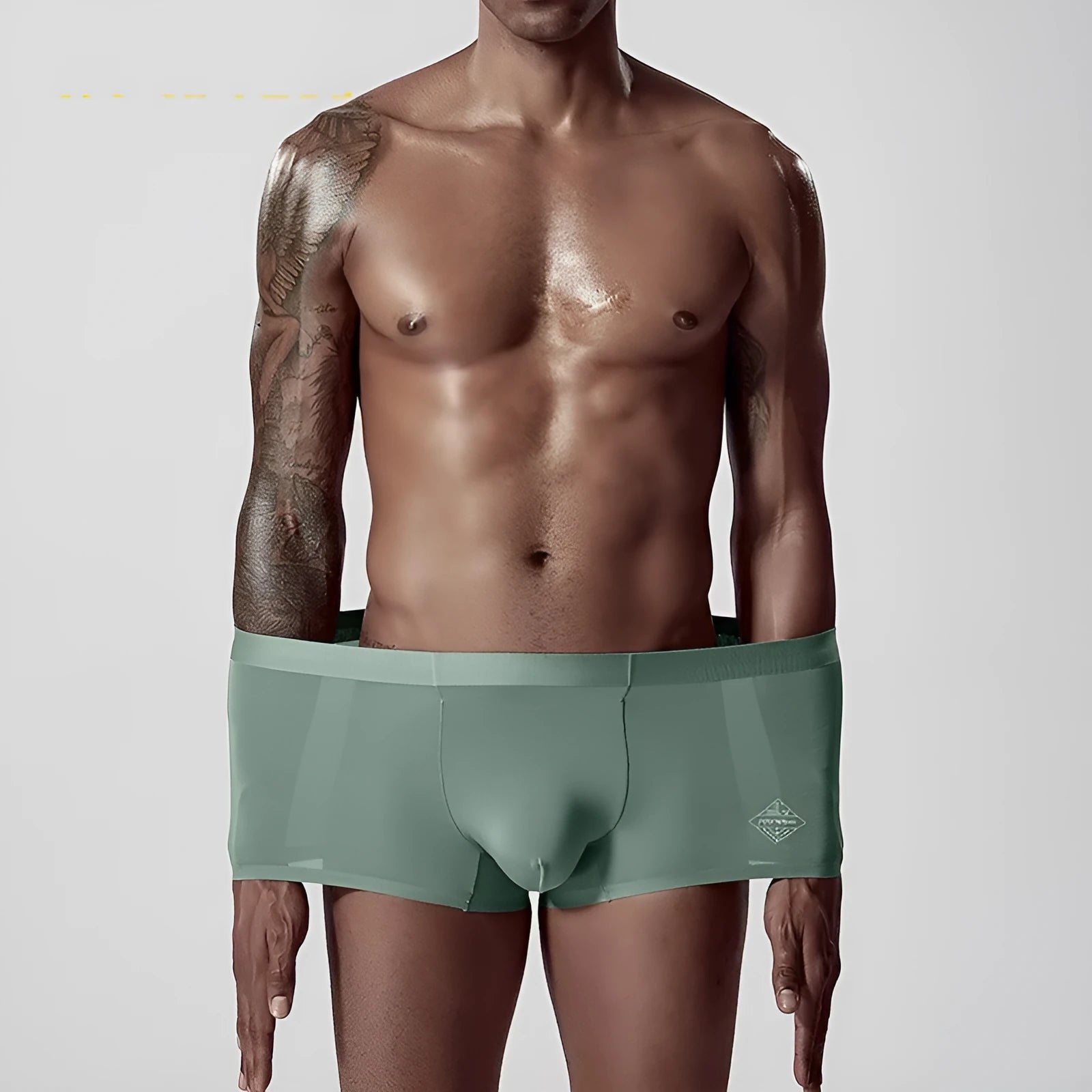 Seamless solid green modal men's mid-waist briefs for body shaping