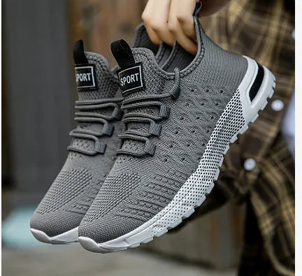 Men's solid colour casual shoes with mesh upper in army green, shown from side perspective.