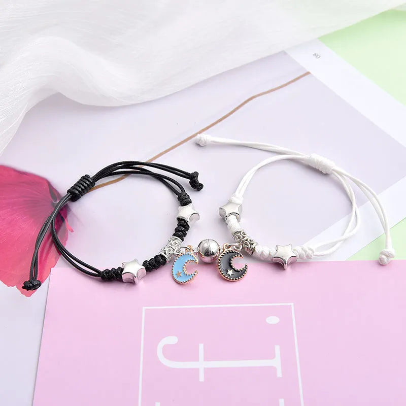 Magnetic couple bracelets with crown and diamond designs in alloy electroplated construction