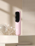 Beige wireless anion hair straightening comb on a table with Type-C cable.