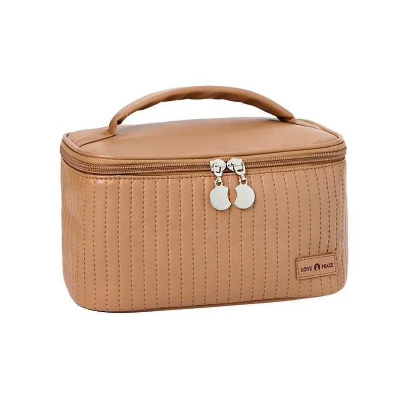 Open-top makeup bag in PU leather showing six colour options including pink, coffee, and light blue
