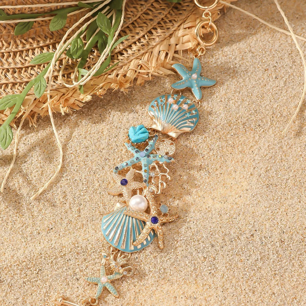 Alloy marine shell boat anchor rhinestone bracelet with starfish details in turquoise colour.