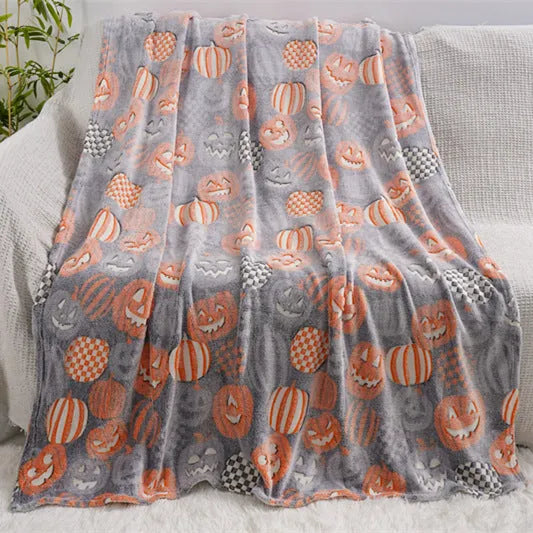 Cartoon style flannel child blanket shown covering an air conditioner, available in multiple colours.