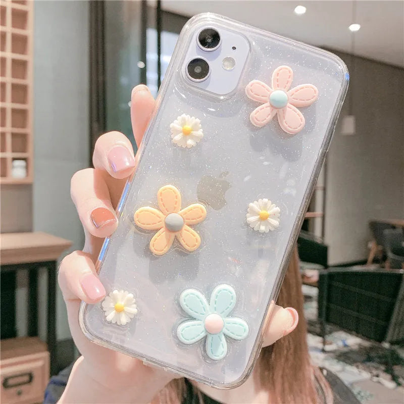 Soft rubber iPhone case with embossed floral pattern and heart design on a white background.