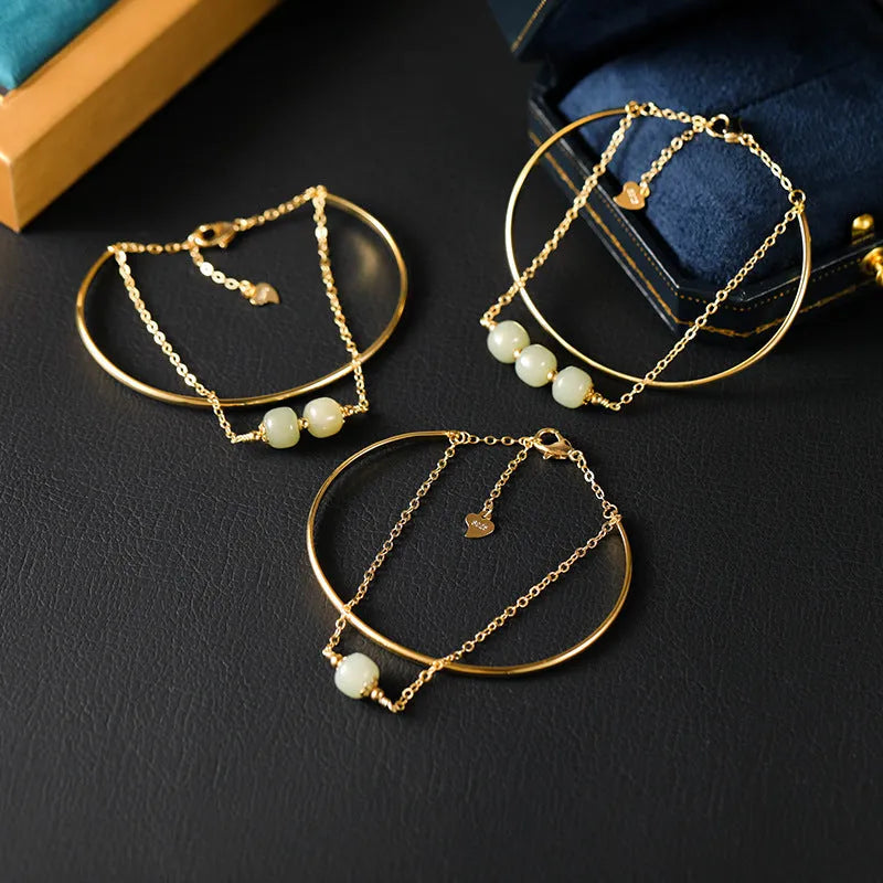 Jade lucky bead bracelet for women with gold inlay treatment in single, double and three beads versions