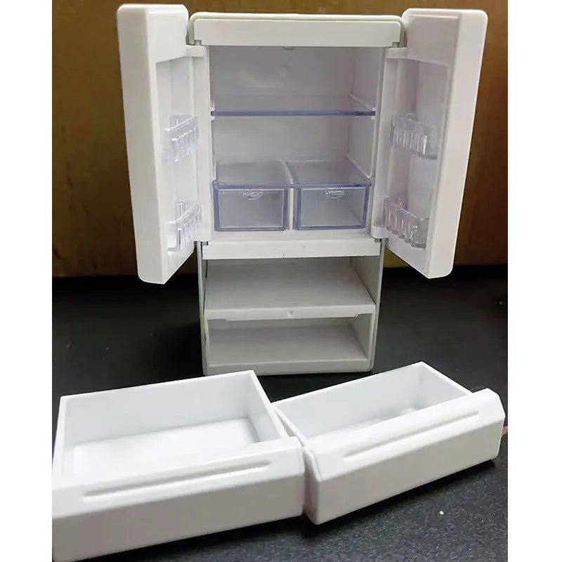 White miniature candy toy plastic model with illuminated feature on display.