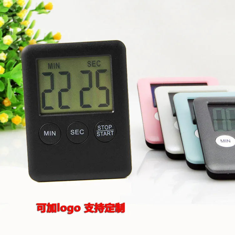 Magnetic kitchen timer with LCD screen showing time display, available in black and white colours
