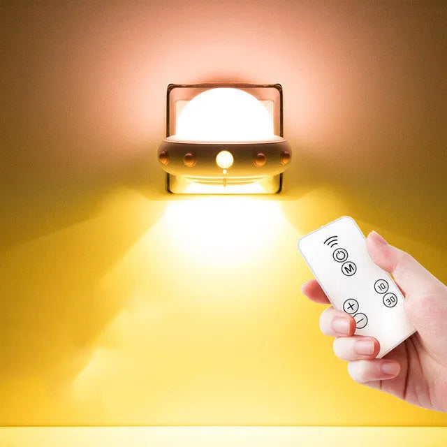 Remote control UFO shaped bedside night light in blue, pink or white colours