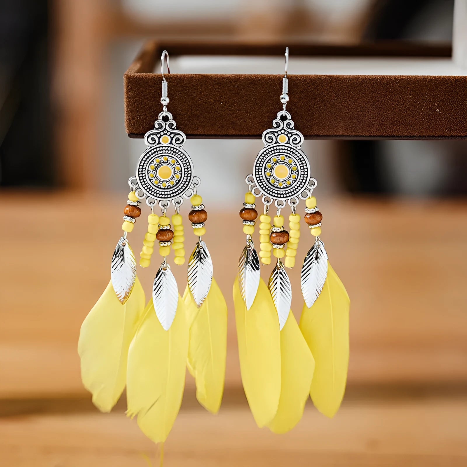 Feather pattern drop earrings with round oil craft design in alloy with electroplated finish
