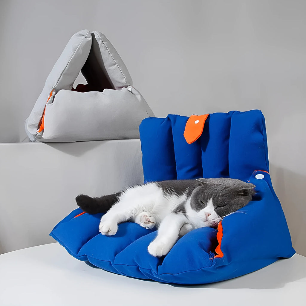 Blue triangular sofa-style cat bed with visible drill holes on the sides for connection.
