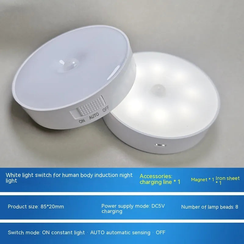 Compact beige motion sensing LED night light with USB charging port and adhesive backing