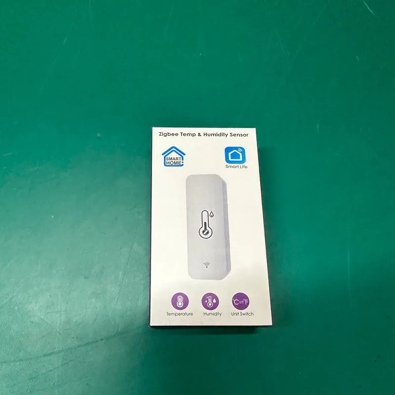 White WiFi temperature and humidity sensor with compact rectangular ABS housing