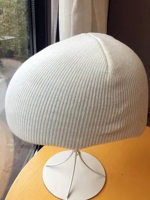 A size L decorative cover for a ski helmet, shown in one of fifteen available colour options.