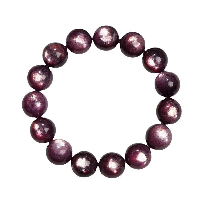 Natural purple lepidolite crystal bracelet with round polished beads on a wrist.