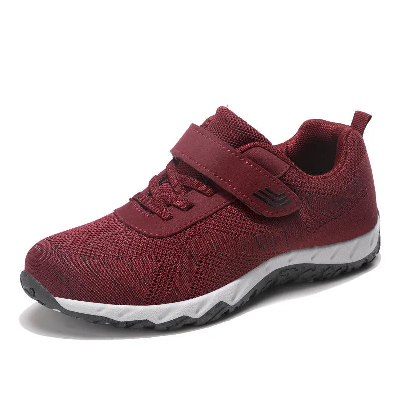 Women's low-top wedge heel shoes in grey purple with breathable mesh upper and Velcro strap.