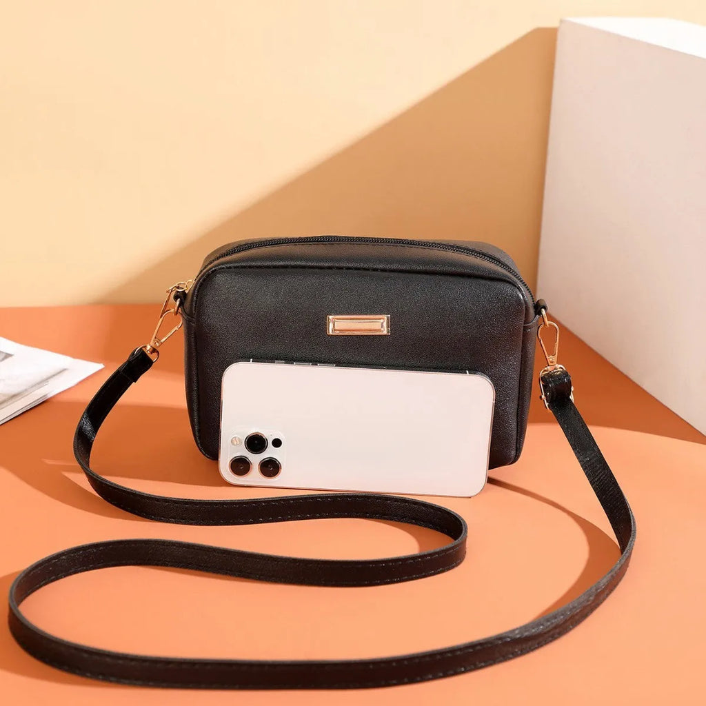 Women's solid colour PU leather shoulder bag with three-dimensional pockets in urban simplicity style