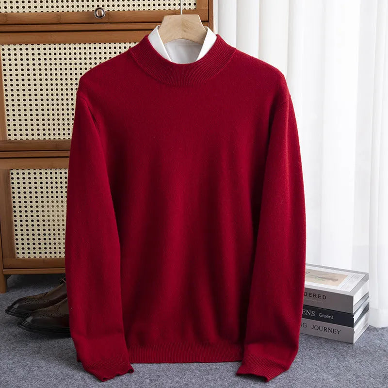 Man wearing a loose-fit half-collar wool sweater in a dark colour, showcasing the knitted texture and neckline design.
