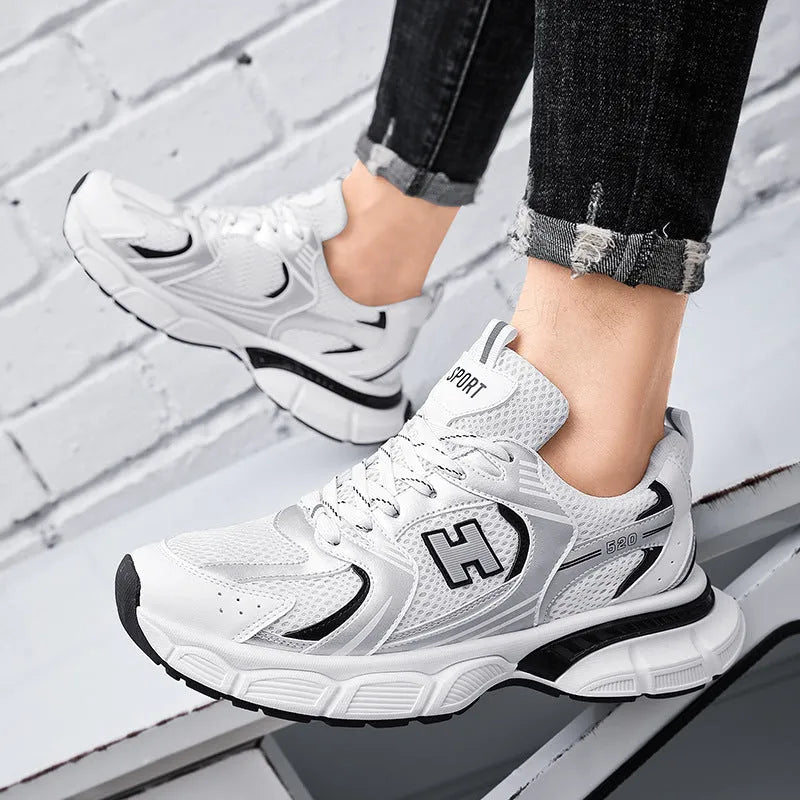 Men's mesh casual running shoes with plastic soles in black, white and gray, or white orange colours