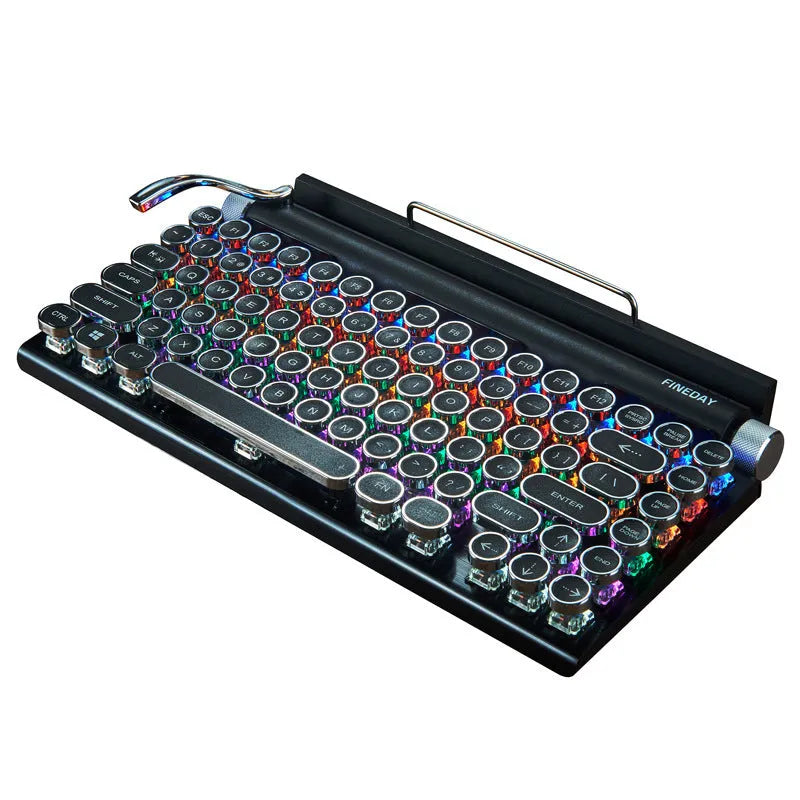 Black Dot Retro mechanical keyboard with colourful backlit keys on a desk.
