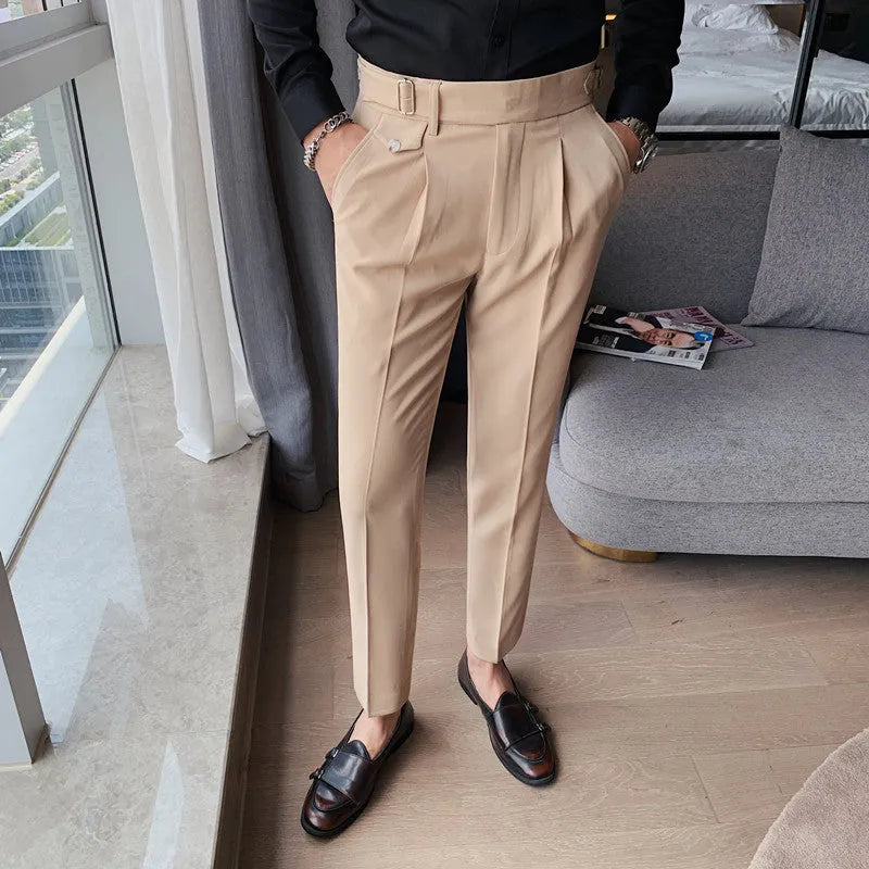 Straight-leg casual trousers in solid colour on hanger showing waistband and leg detail