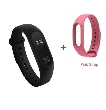 Xiaomi Mi Band 2 black smartband on wrist showing OLED display with heart rate and step count.