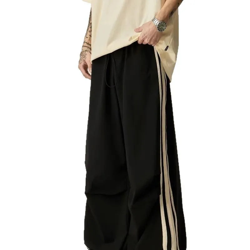 Men's black wide-leg climbing trousers with high waist and straight-leg design for summer outdoor activities